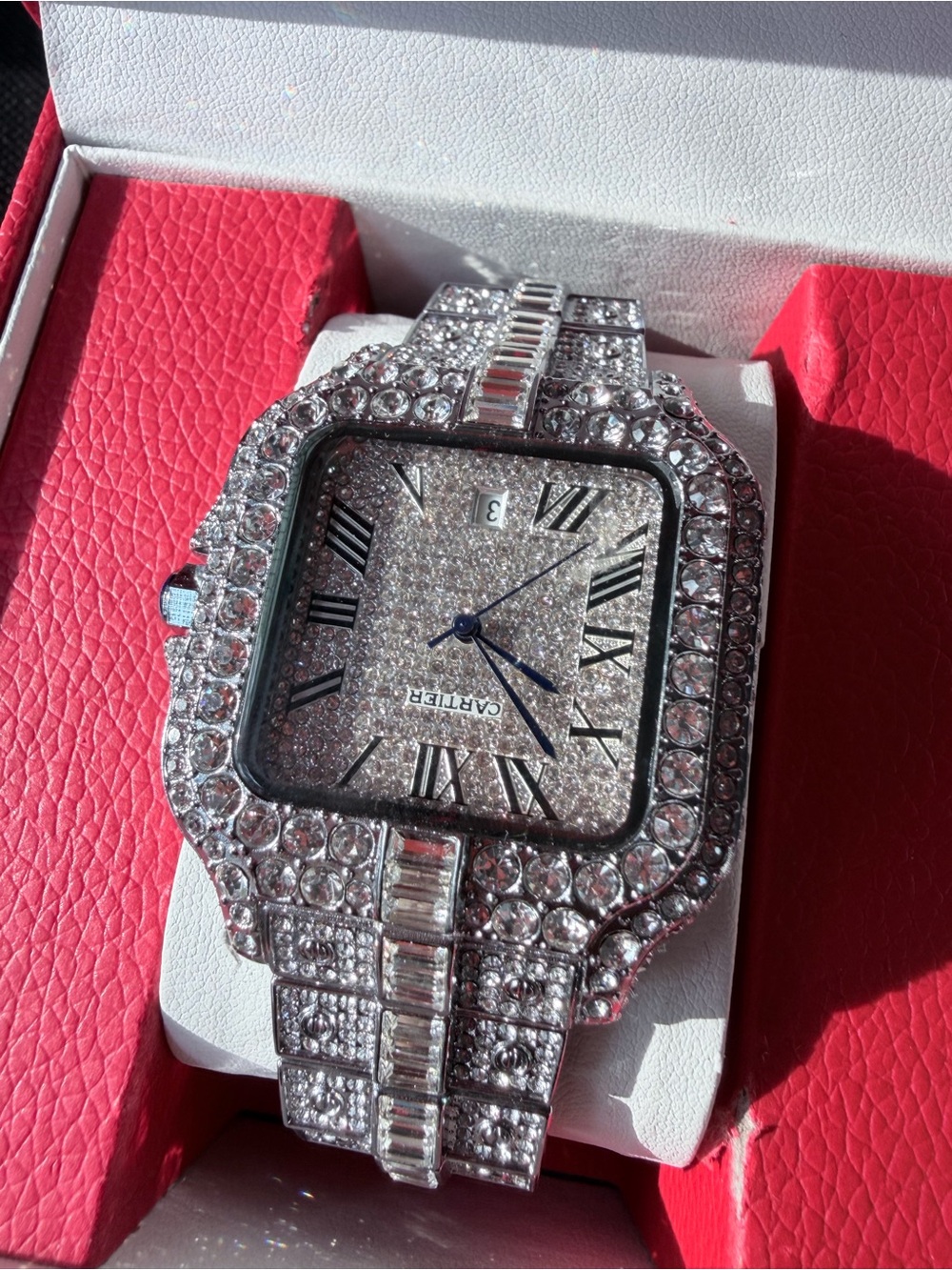 Cartier Diamond-Embellished Silver Tone Watch with Blue Hands
